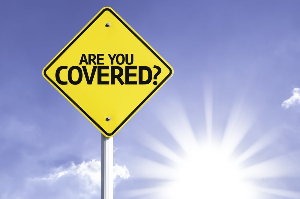 Are you Covered? road sign with sun background